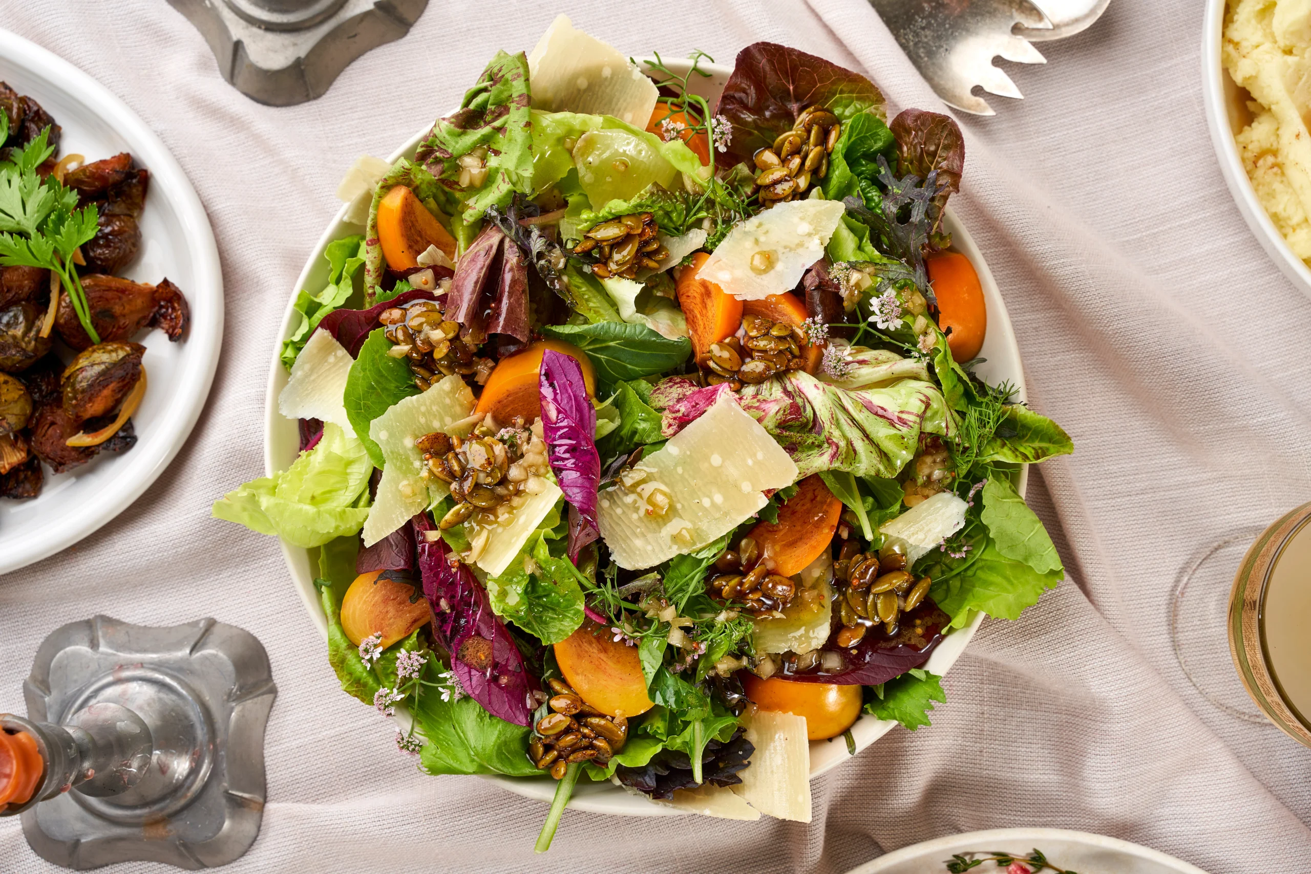 Fall Lettuces, Sunflower Seed Brittle, Persimmon, Shaved Parmesan